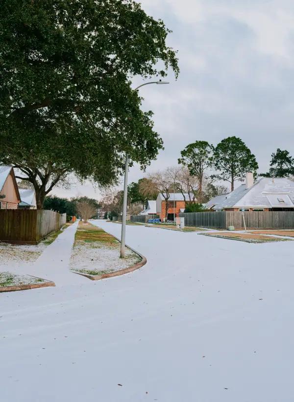 Light snow on a Southern neighborhood street (representative photo)